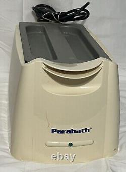 Bain de paraffine Hand Parabath modèle 24050 120v hygiénique avec 5 recharges. Mains qui travaillent